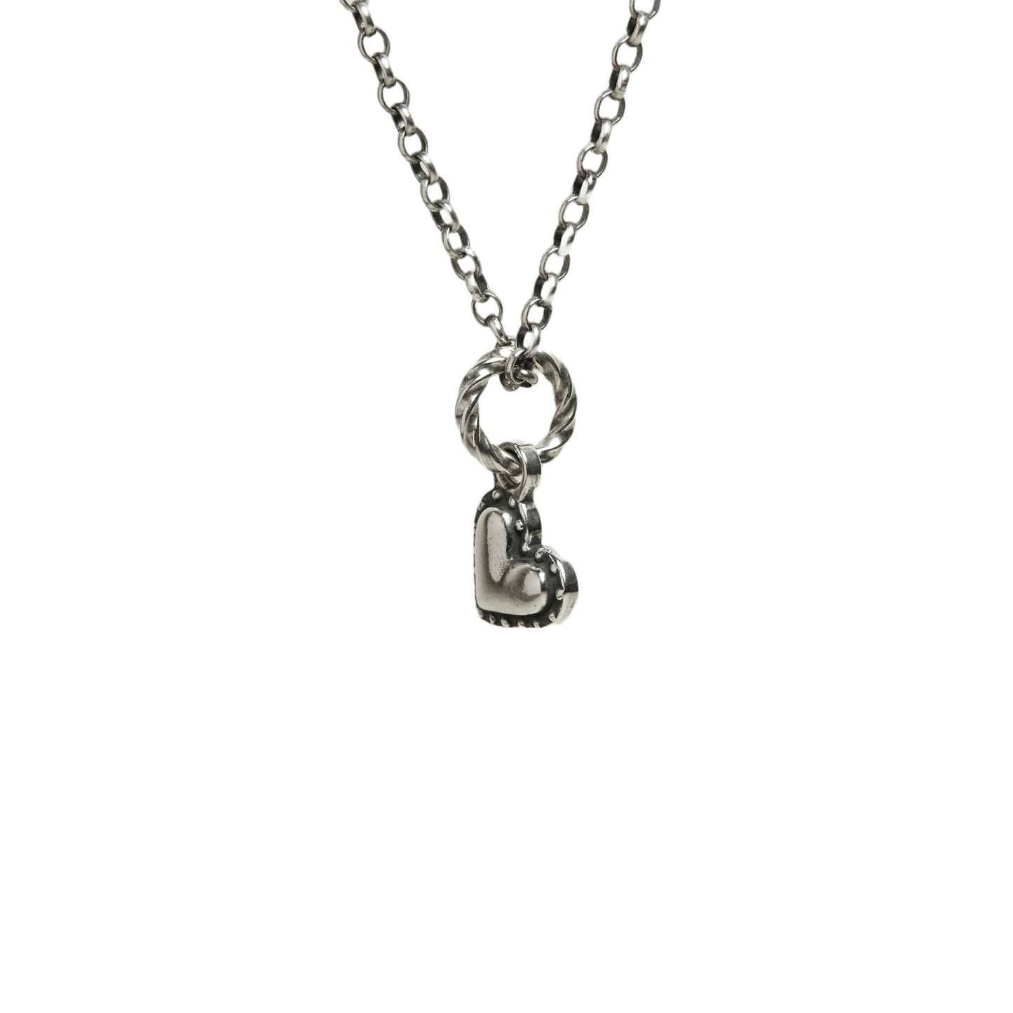 Riveted silver heart