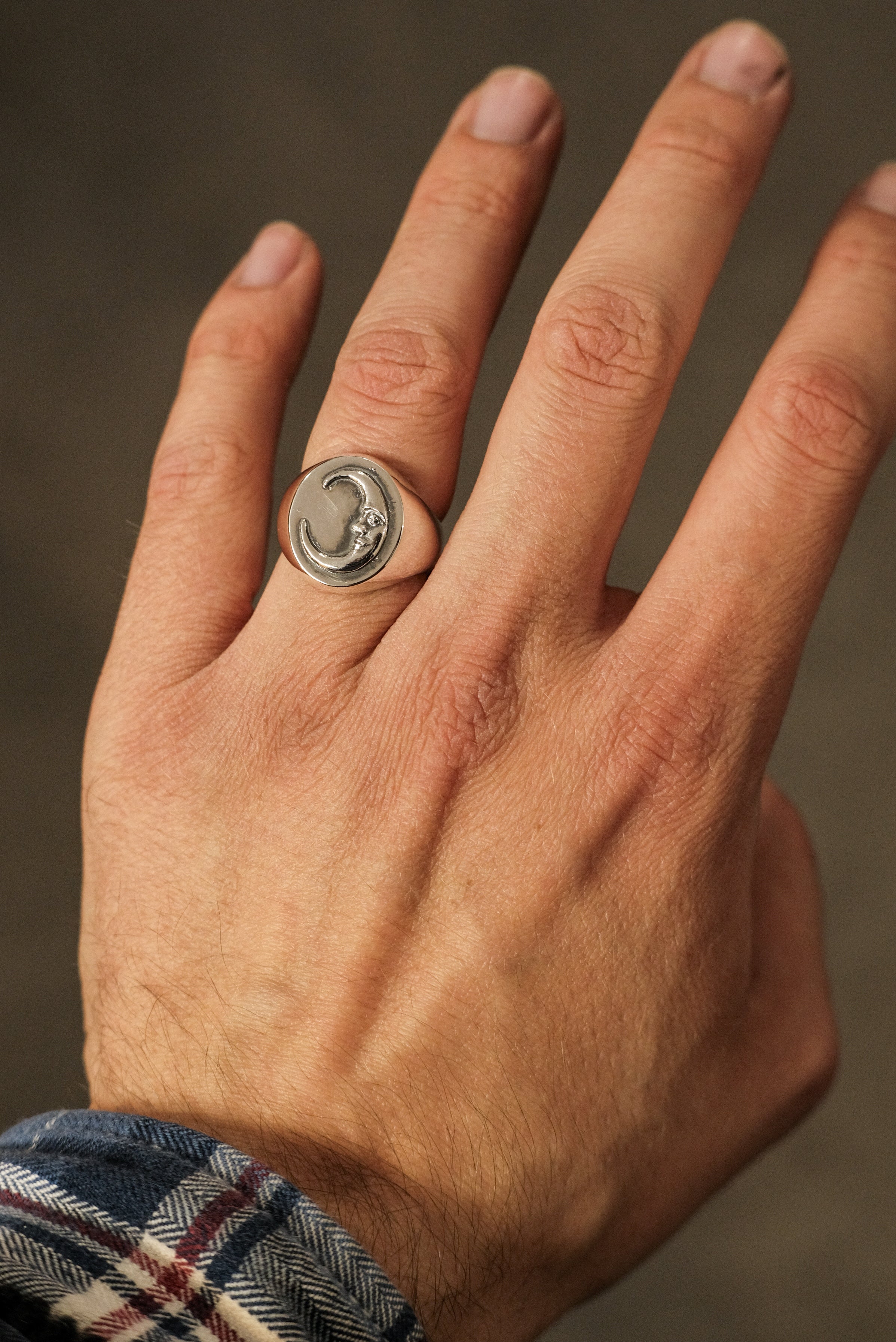 Crescent moon face oval signet ring